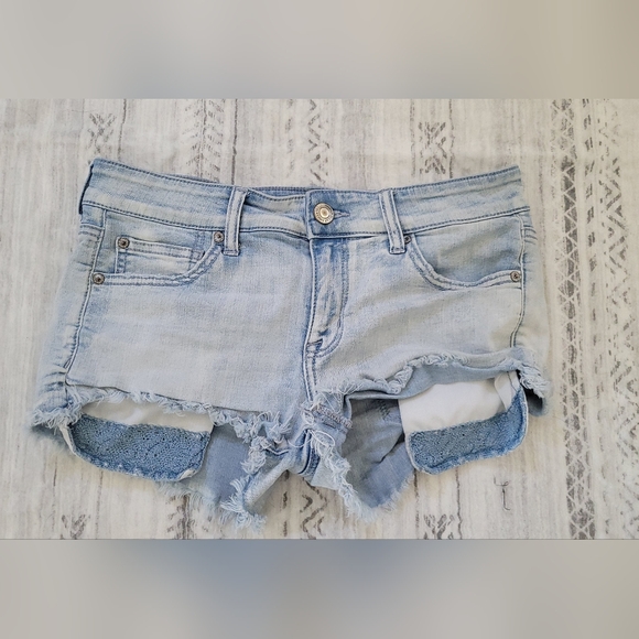 American Eagle Outfitters Pants - American Eagle Outfitters distressed blue denim shorts Size 10